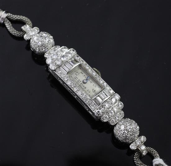 A ladys Art Deco platinum, white gold and diamond cocktail watch, 6in.